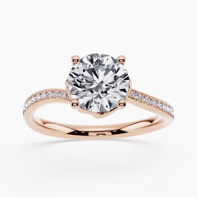 Curved engagement ring with a contoured band and center diamond