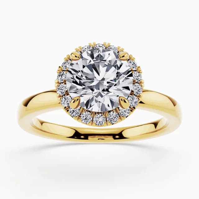 Halo engagement ring with a central diamond and surrounding stones