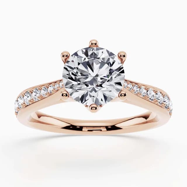 Vow of Love Collection ring with intertwined gold and diamond elements