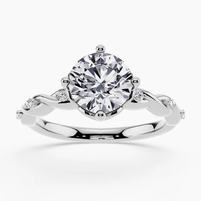 Twisted-band engagement ring with a single brilliant diamond