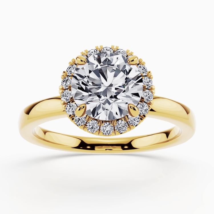 Halo engagement ring with a central diamond and surrounding stones